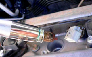 Adjusting and replacing spark plugs on a Toyota Corolla: step-by-step instructions